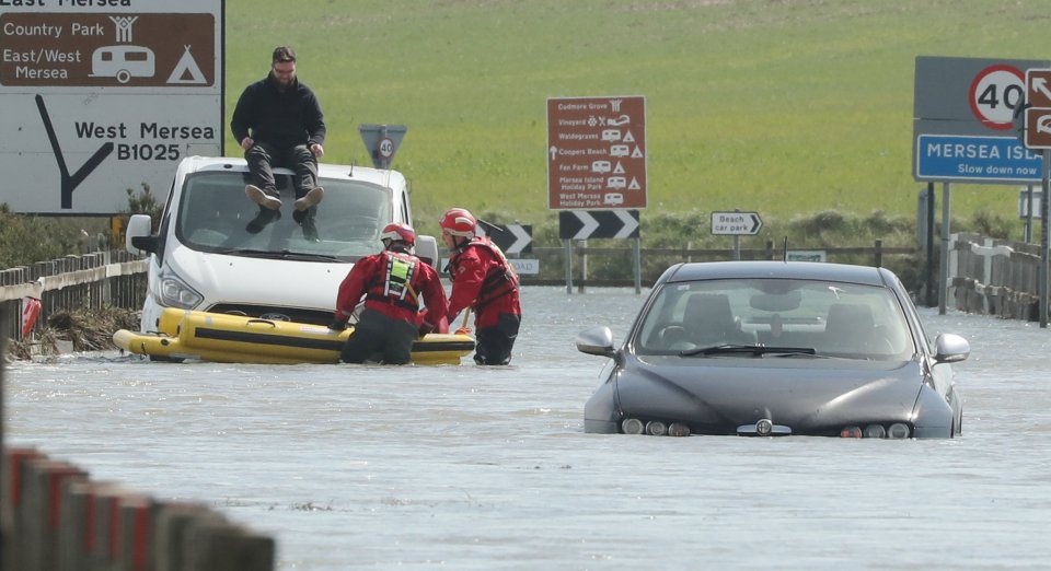 A van driver was rescued from his roof by Essex County Fire & Rescue Service this afternoon