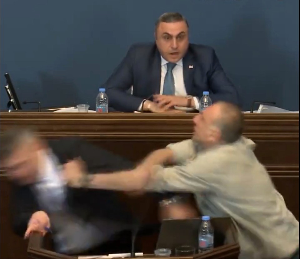 The blow of the force knocked both of the feuding men to the floor