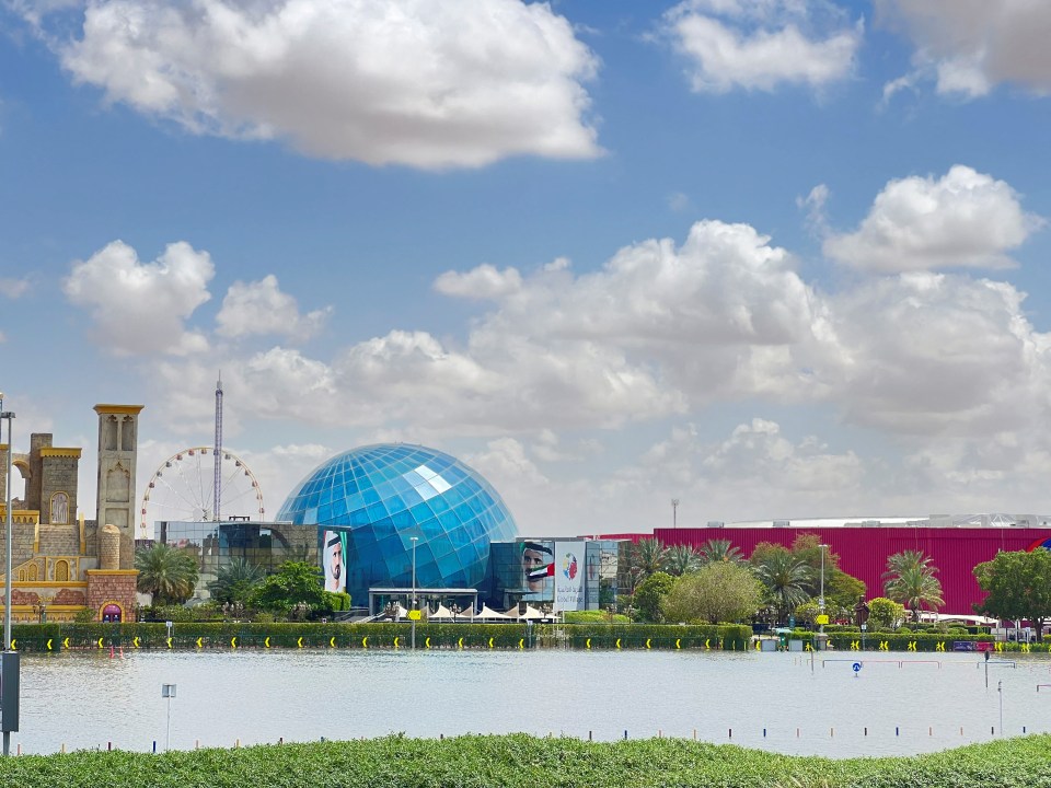 Water floods Global Village after the rainstorm in Dubai