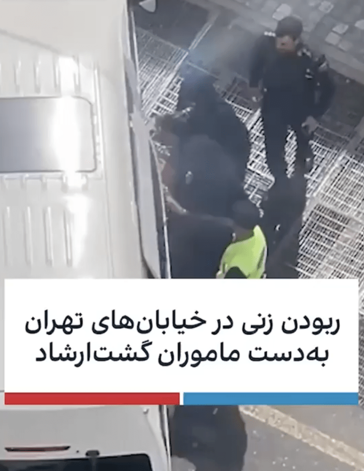 Two women in hijab are seen pushing the woman into the back of a van