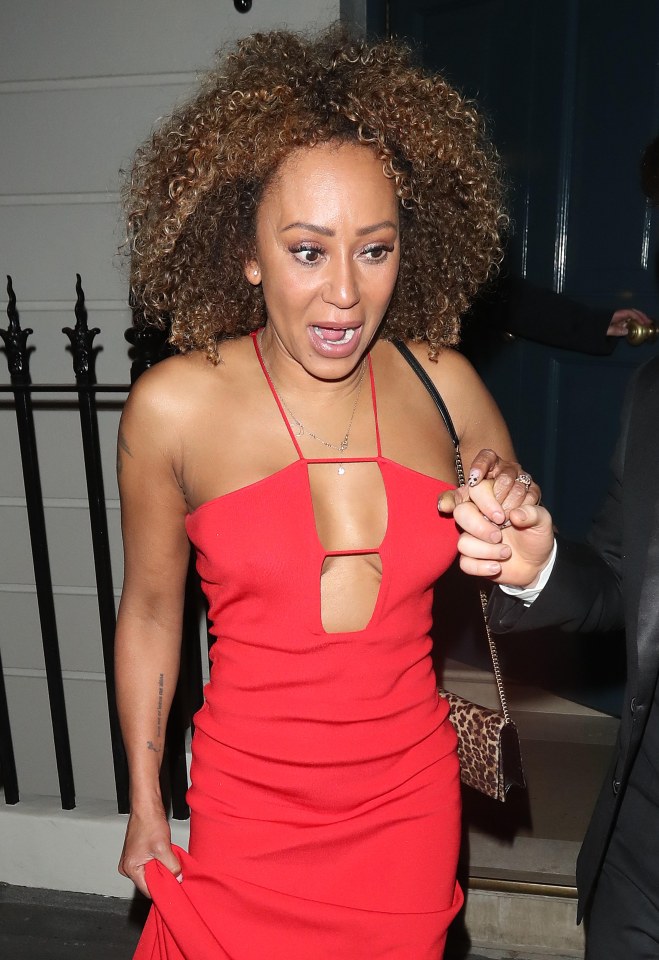 Scary Spice stunned in a red dress and nodded to her Spice Girls roots with a leopard print bag