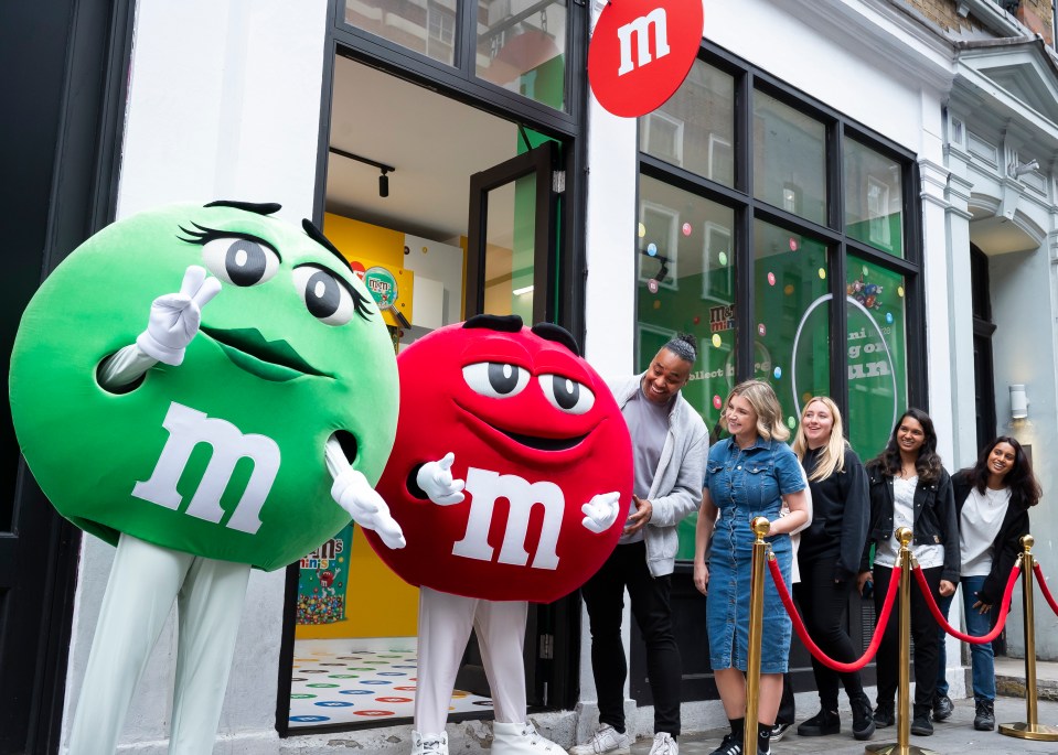 M&M’s superfans eagerly wait in line outside of M&Ms Central London store to get their hands on the new M&Ms Minis