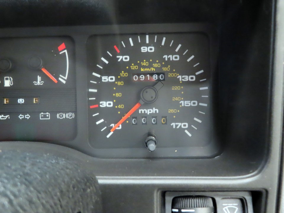 A close-up of the classic car's speedometer