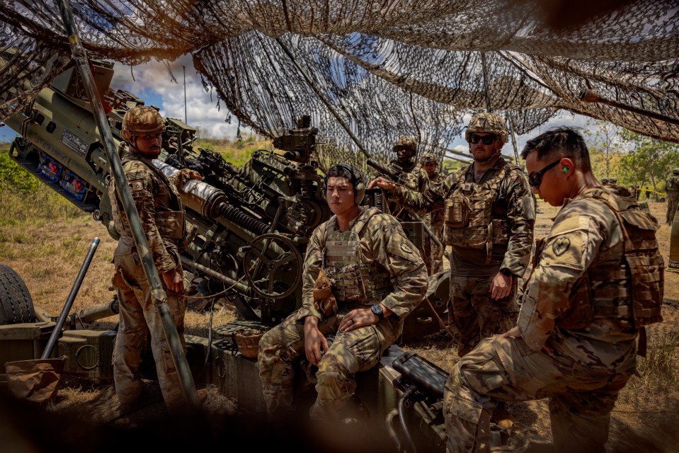 US troops prepare to fire a M777 Howitzer during a drill in the Philippines in April