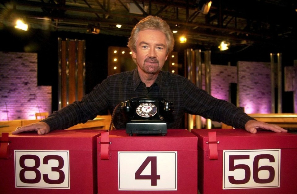 Editorial use only Mandatory Credit: Photo by ITV/Shutterstock (680190es) 'Deal or No Deal' TV - 2006 - Noel Edmonds ITV ARCHIVE