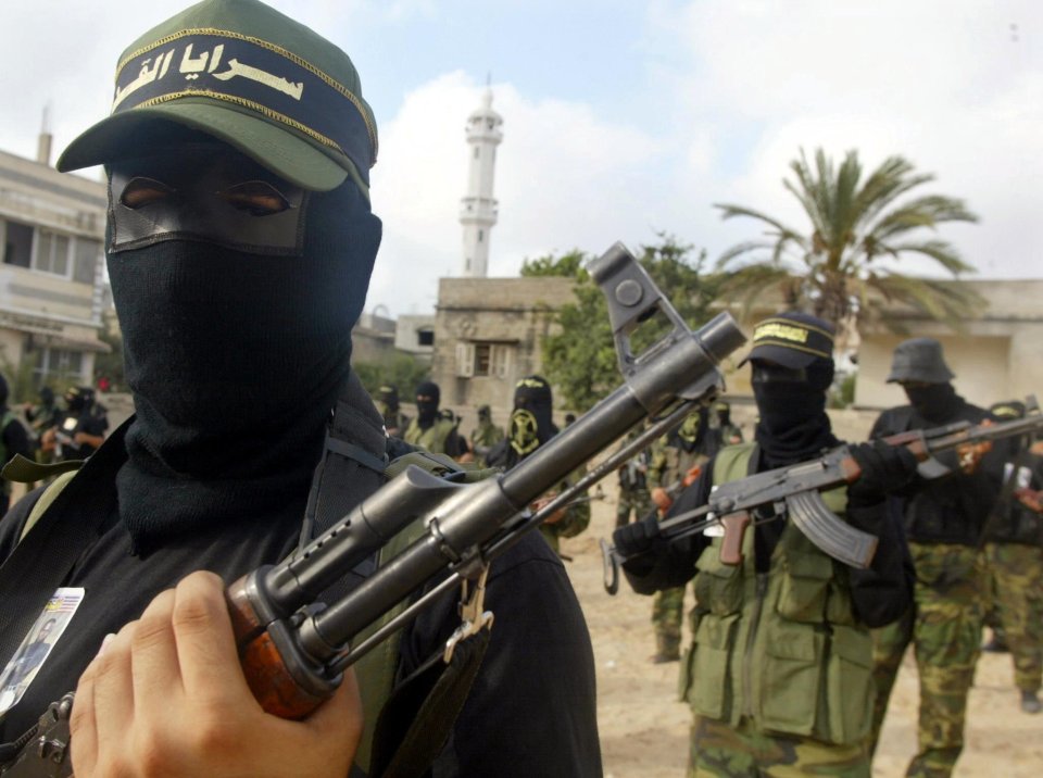 Armed Palestinian militants take part in a rally held in Gaza City; picture is historical