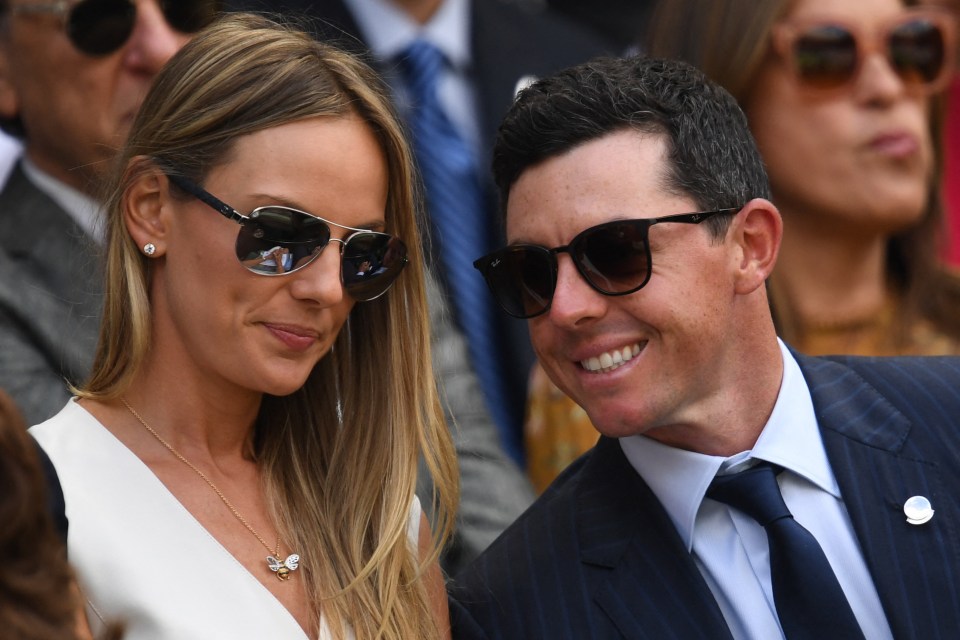 Rory McIlroy and Erica watch Novak Djokovic play at Wimbledon Championships, 2018