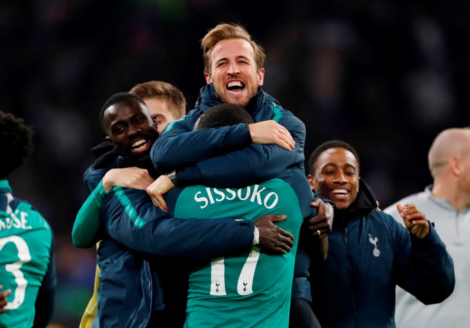 Moussa Sissoko hugs Harry Kane after the match