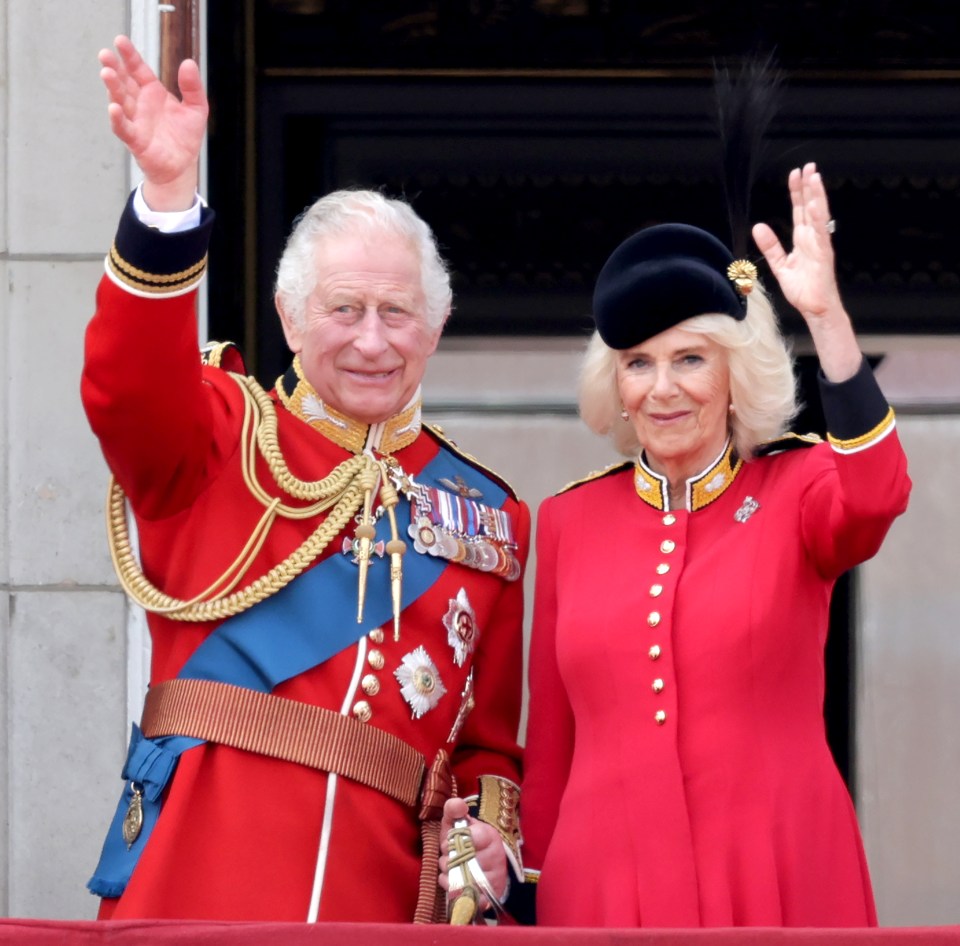 King Charles and Queen Camilla wave to the crown during last year's Trooping the Colour