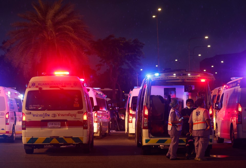 Rescue teams gear up to move the injured to hospitals in Bangkok on Tuesday evening