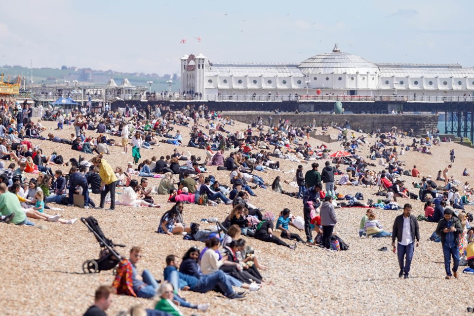 Hundreds relax on the beach in Brighton