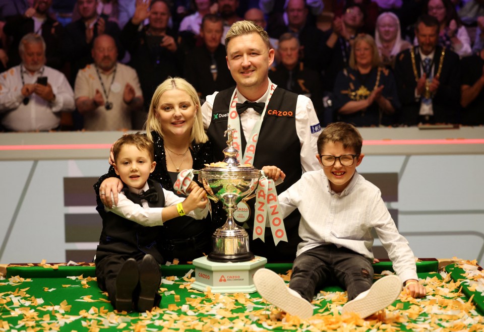 Kyren Wilson shares his glory with his family