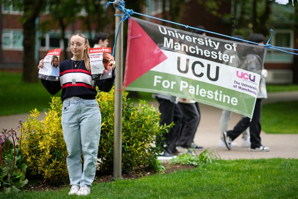 A lone student stands by the camp to highlight the plight of the October 7 massacre hostages still being held by Hamas terrorists