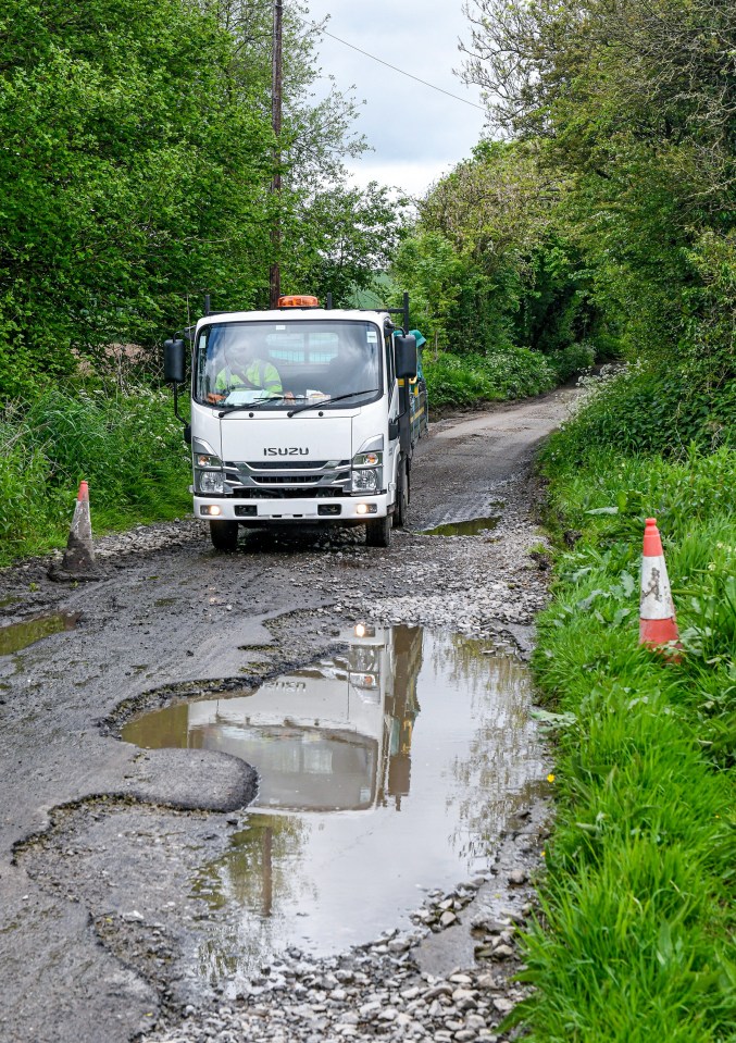 Britain's biggest pot hole has been unearthed following torrential rain