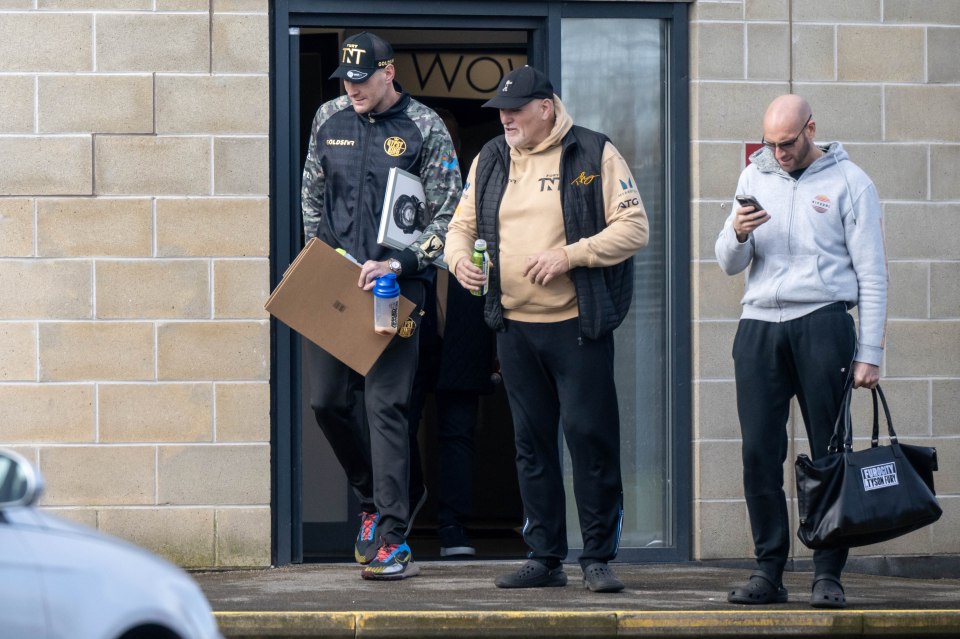 Fury and dad John leaving the gym after a training session