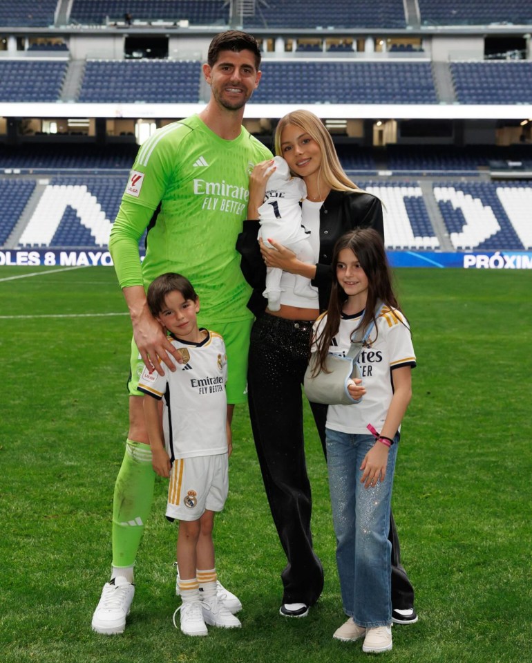 Mishel pictured with her footballer hubby and their kids