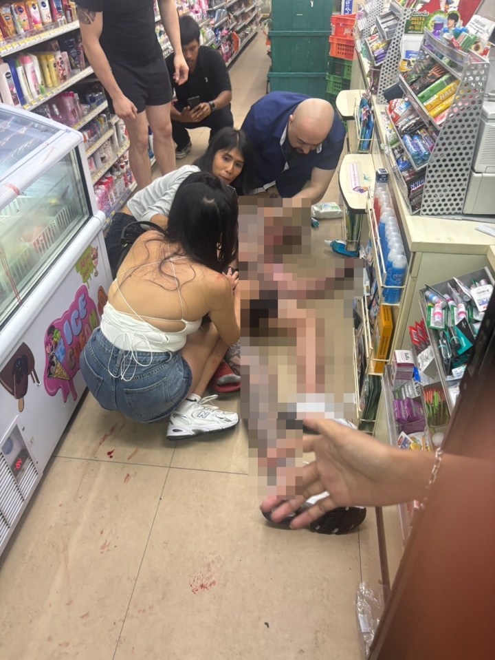 The Brit lies down on the shop floor following the alleged attack