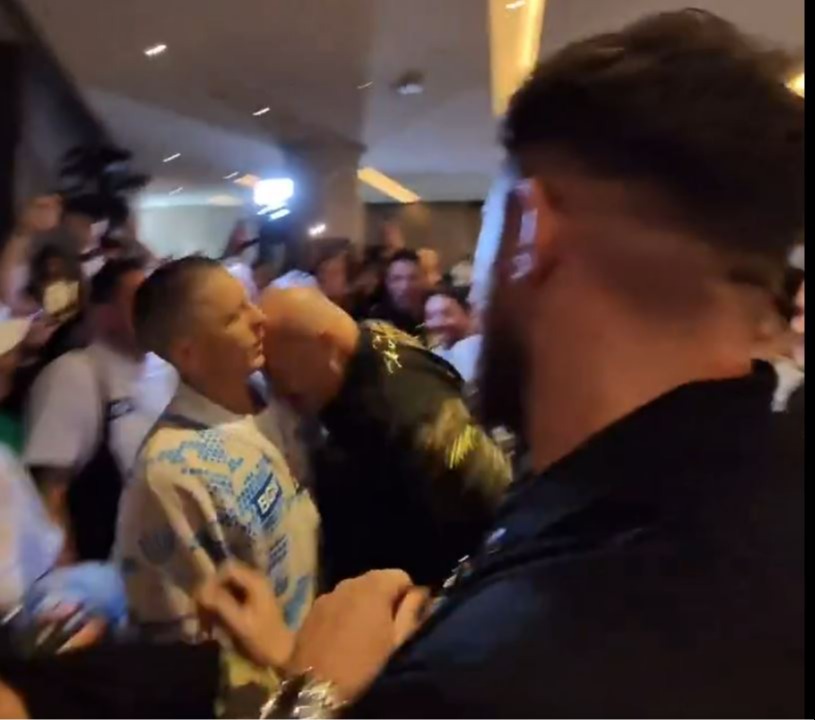 Footage emerged of John headbutting a member of Usyk's team