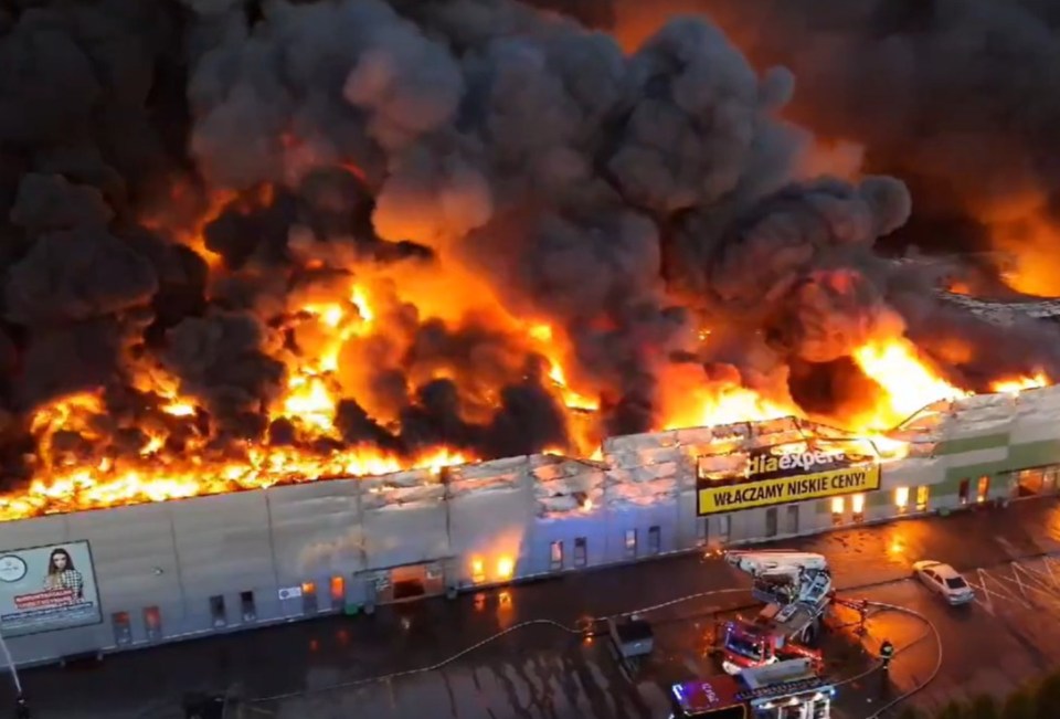 A huge fire has ripped through a shopping centre in Warsaw