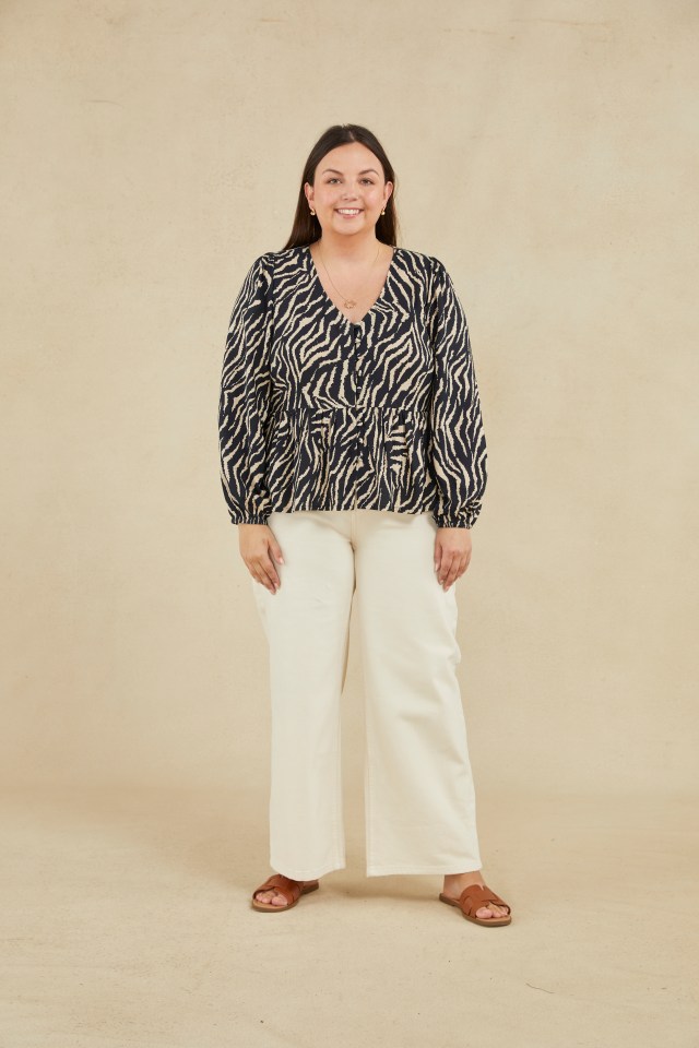 The Carol blouse has a secret peplum that adds definition and shape around the waist.