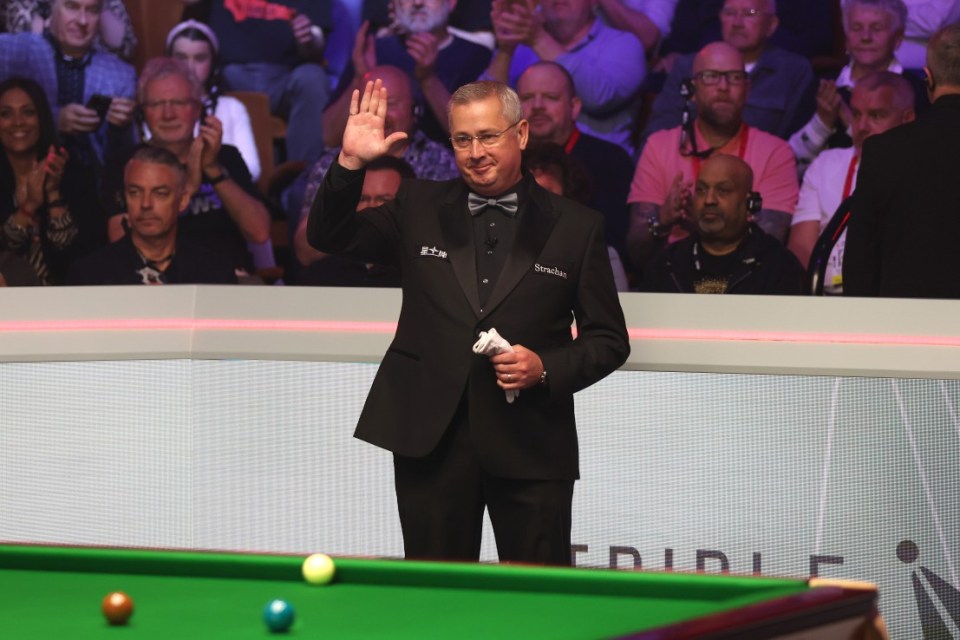 SHEFFIELD, ENGLAND - MAY 05: Referee, Paul Collier acknowledges the audience before the Final match between Kyren Wilson of England and Jak Jones of Wales during day sixteen of the Cazoo World Snooker Championship 2024 at Crucible Theatre on May 05, 2024 in Sheffield, England. (Photo by George Wood/Getty Images)