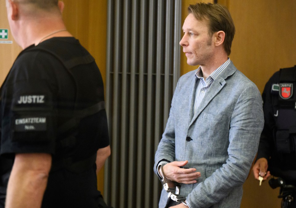 The defendant Christian B. enters the courtroom at Braunschweig Regional Court in Brunswick, Germany, Wednesday May 15, 2024. Christian B. is accused of three cases of aggravated rape and two cases of sexual abuse of children in Portugal. Investigators also suspect the German in the Maddie case. (Julian Stratenschulte/Pool via AP)