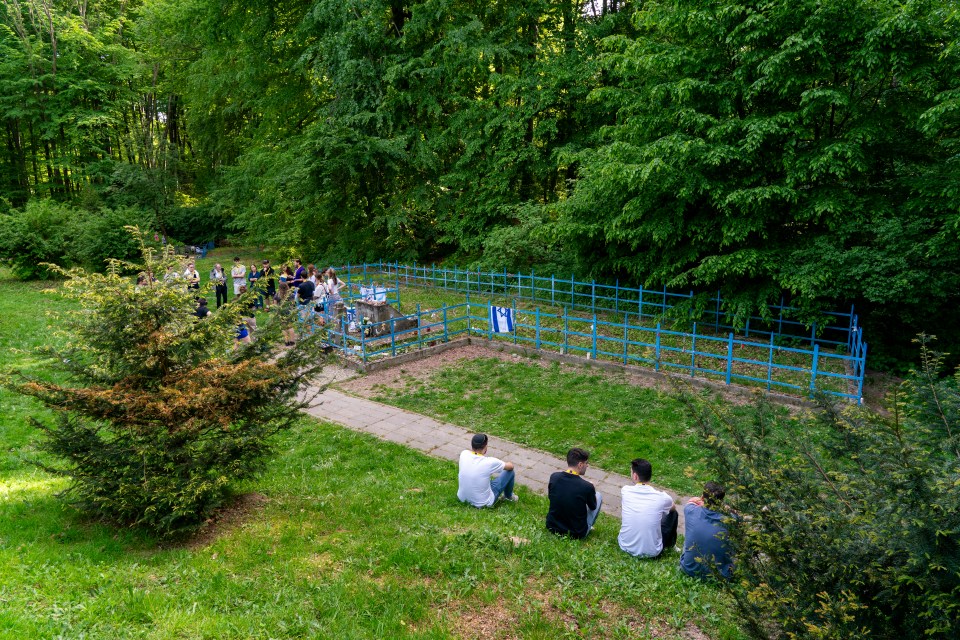 A blue fence marks an area in the forest near Zbylitowska Gora where 800 children were taken from an orphanage and killed by the Nazis