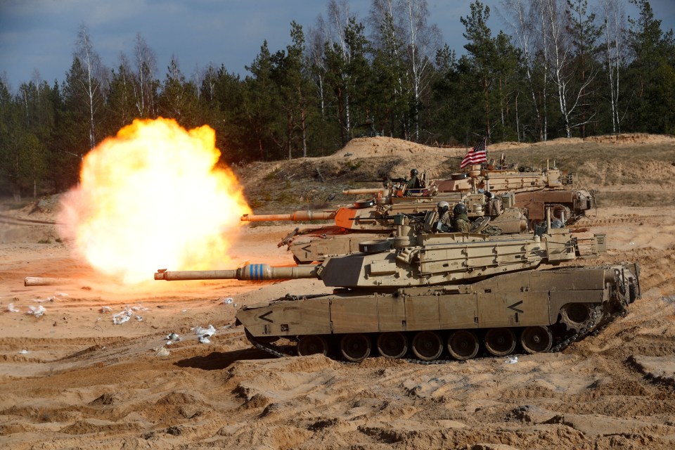 A US Army tank fires during Nato drills in Latvia