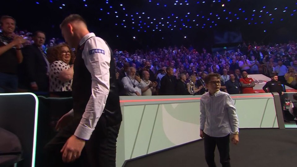 Fans spotted the moment Kyren Wilson's son shook Jak Jones' hand