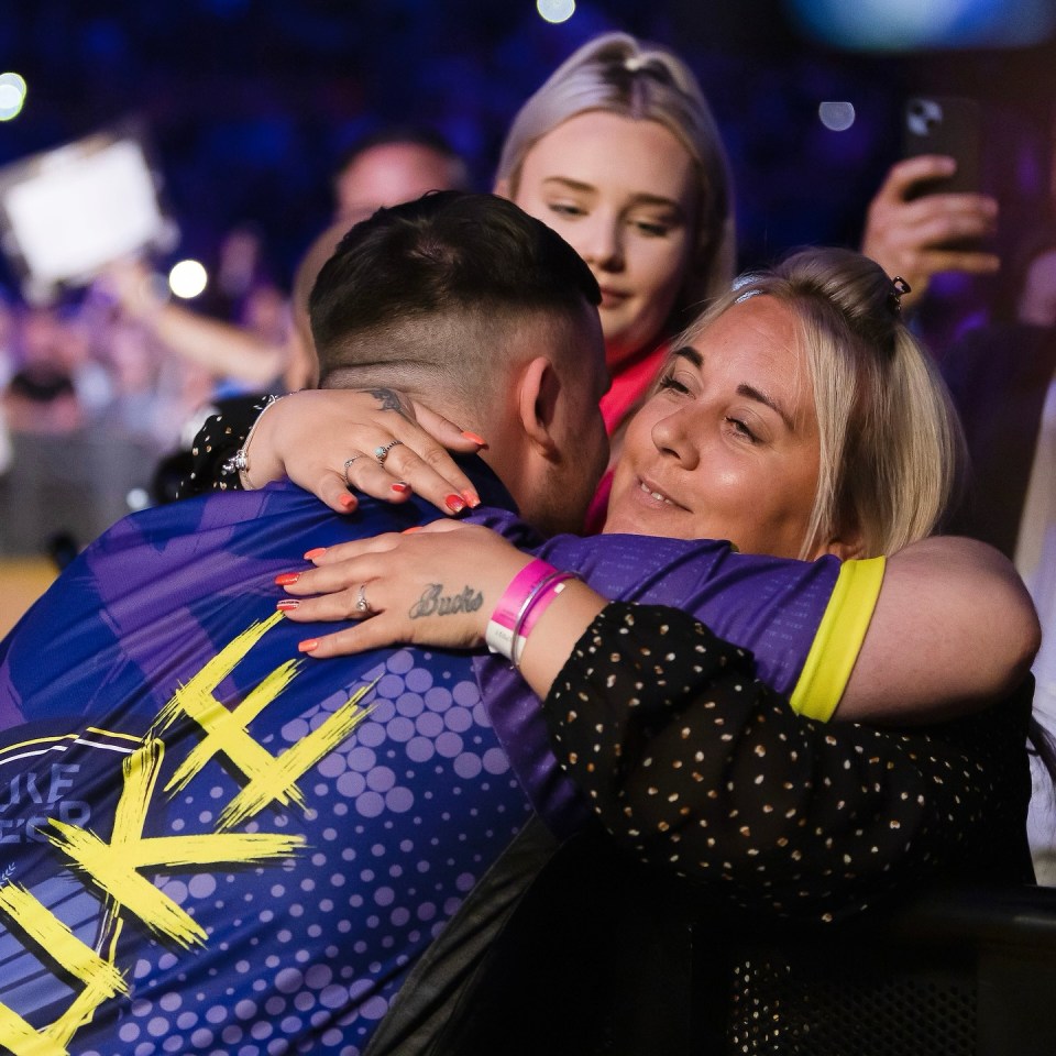 Littler received a hug from his mum after his brilliant win at the O2