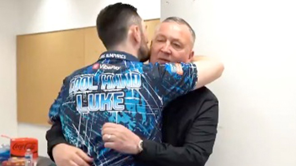 Humphries embraced Durrant after the darts icon had lost his father