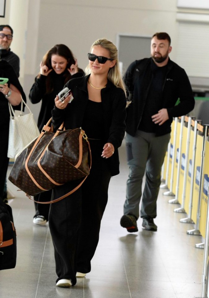 EXCLUSIVE: Molly-Mae Hague Is Flanked By Her Security As She Arrives At The Airport For Her Sister's Hen Weekend. The former Love Island star shut down split rumours with fiance Tommy Fury as she flashed her large engagement ring. Molly, who is said too be worth millions, arrived at the airport in a convoy of four Mercedes people carriers, leaving no expense spared for sister Zoes hen do. Pictured: Molly-Mae Hague Ref: SPL10828487 170524 EXCLUSIVE Picture by: SplashNews.com Splash News and Pictures **USE CHILD PIXELATED IMAGES OR FOOTAGE IF YOUR TERRITORY REQUIRES IT** USA: 310-525-5808 UK: 020 8126 1009 eamteam@shutterstock.com World Rights