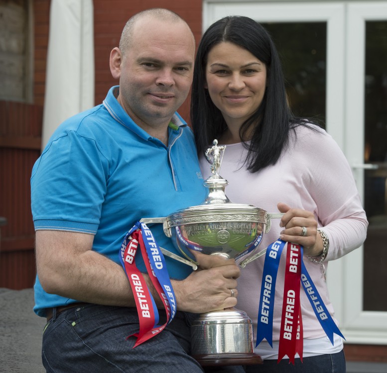 Bingham, pictured with wife Michelle, was world champion in 2015