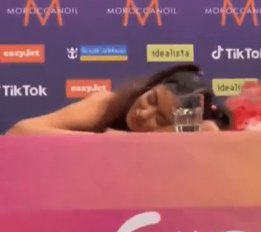 Greek singer Marina Satti was seen theatrically falling asleep at the Eurovision press conference when Eden was speaking