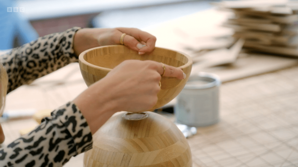 Stacey stuck two bowls together to create a sphere, then another on top