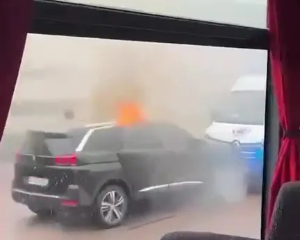 A black SUV rammed into the police convoy before the gunmen pounced