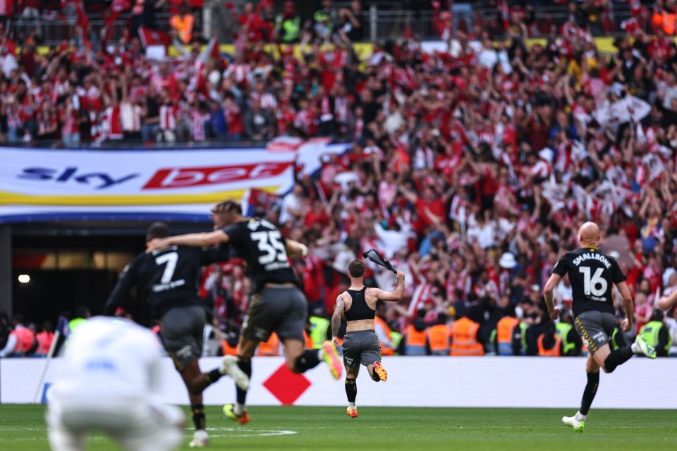 The striker celebrated with the travelling Saints support