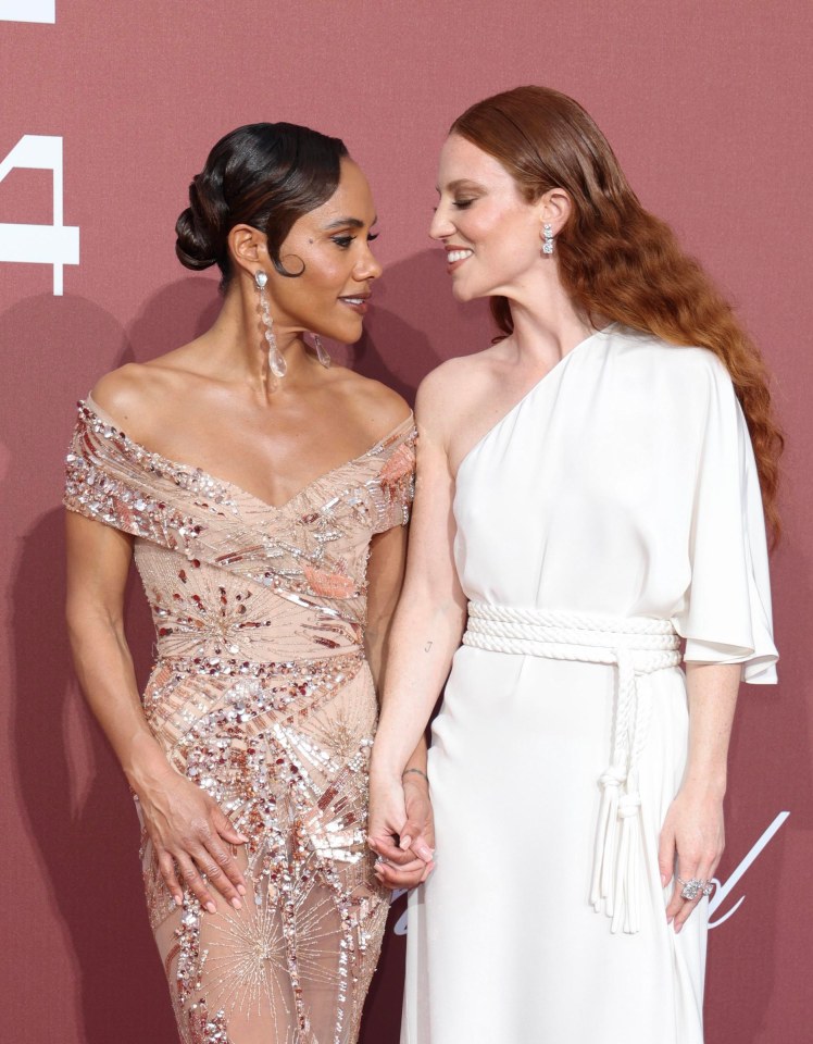 Alex Scott and Jess Glynne held hands at the event