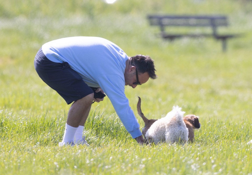 Unfortunately he had to do some dirty work and pick up his pup's poop