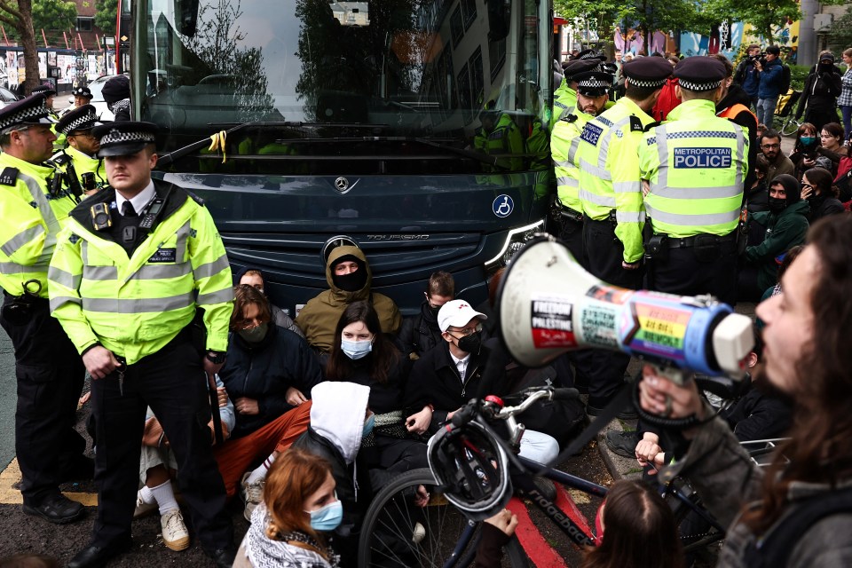 Police have clashed with protesters at the scene