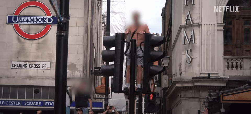 Inebriated fans climbed on top of traffic lights, buses and lamposts