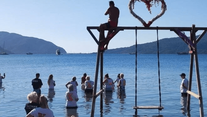 The group of tourists were filmed scattering the ashes at the Uzunyali beach