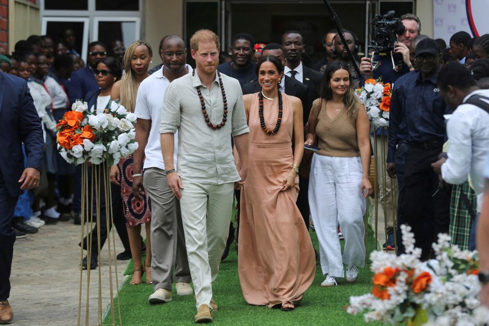 The couple arrived at the school just hours after touching down in Nigeria