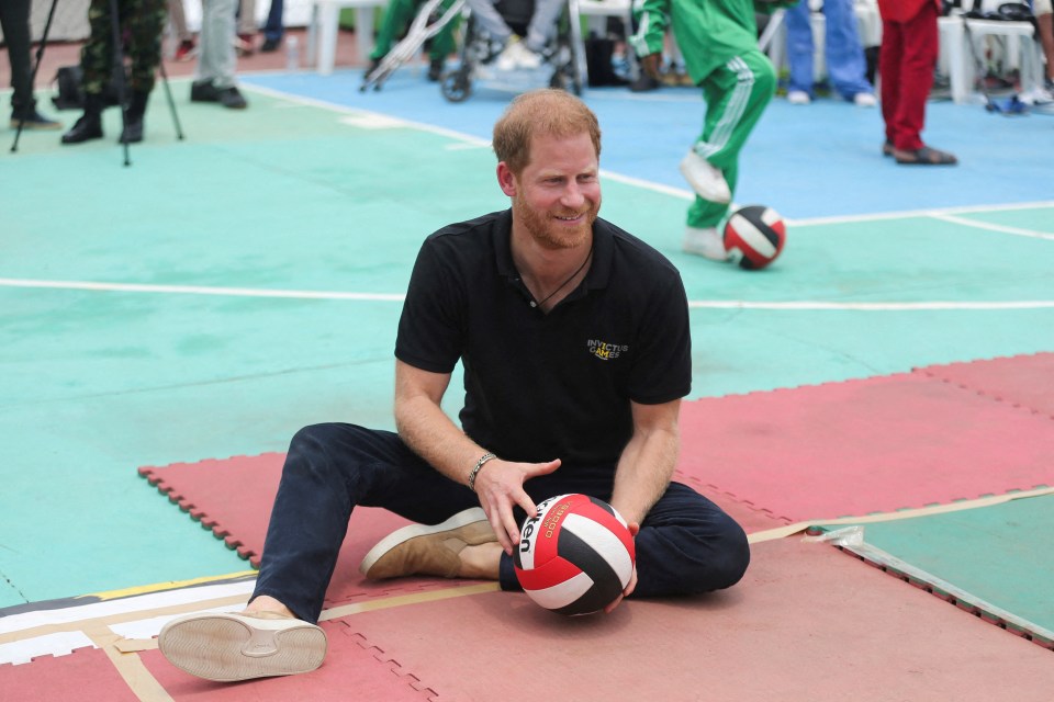 Prince Harry at a volleyball match at a Nigerian army officers’ mess,, May 11