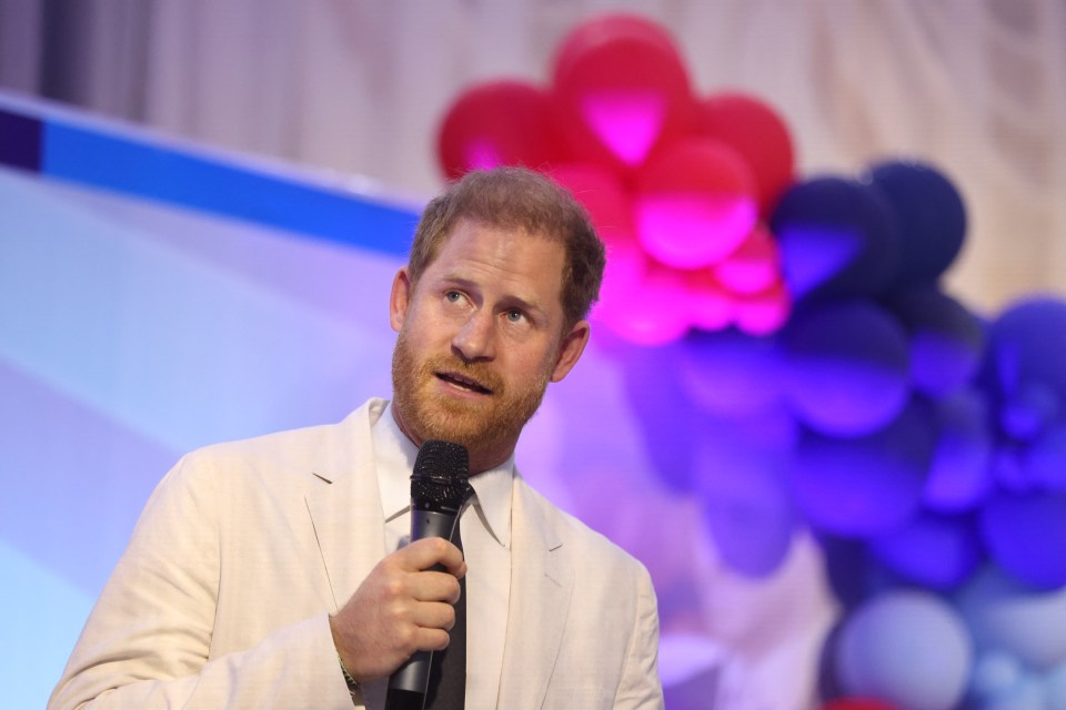 Prince Harry gives a speech as he attends a Sit Out at the Nigerian Defence Headquarters in Abuja on May 11