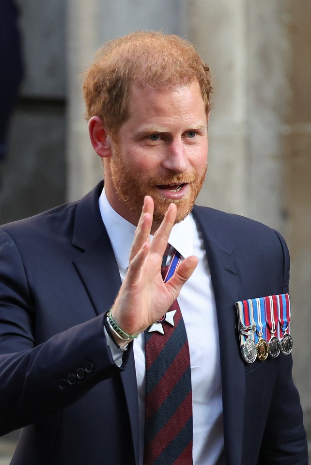 Prince Harry waves as he leaves after attending the Invictus Games Foundation 10th Anniversary Service of Thanksgiving