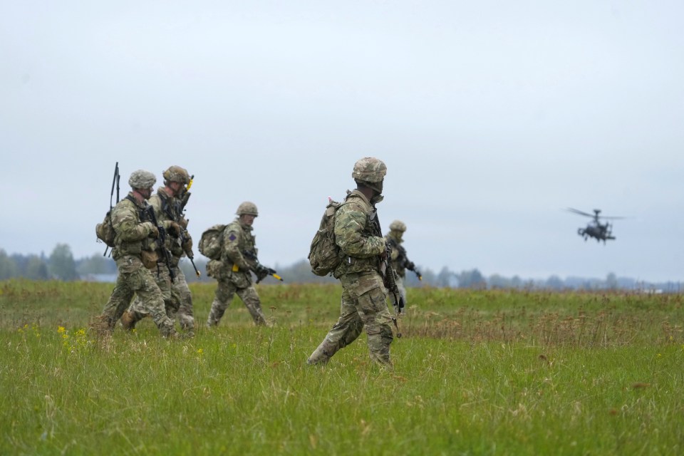 British and U.S. paratroopers take part in a Swift Response military exercise in Estonia