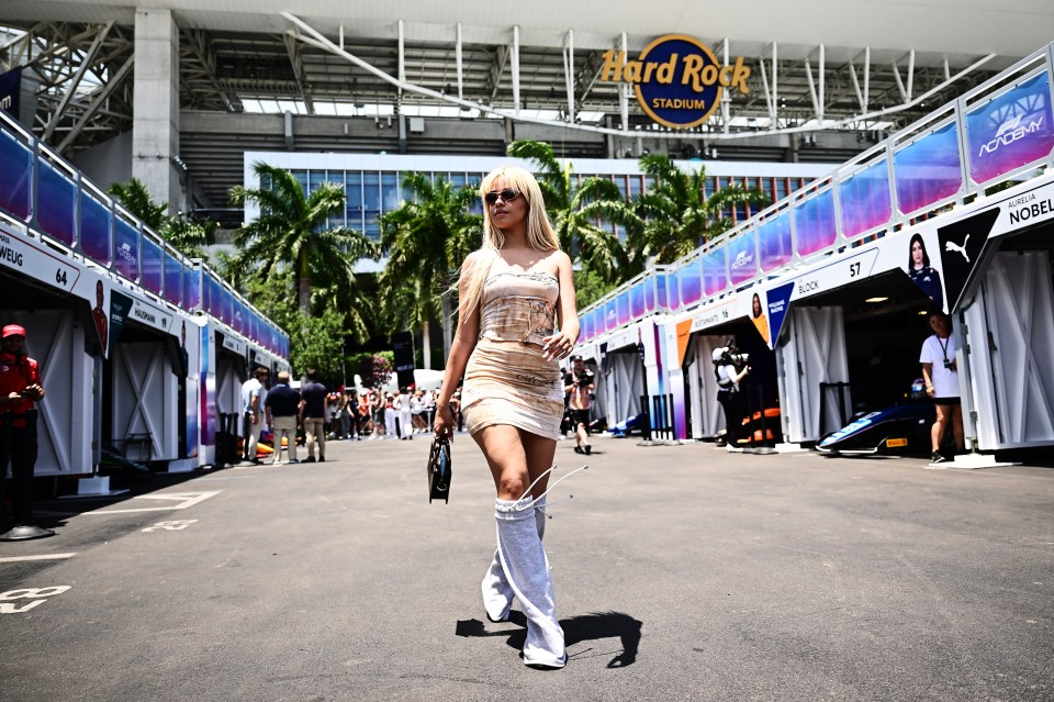 Camila wore knee-high boots to celebrate raceday