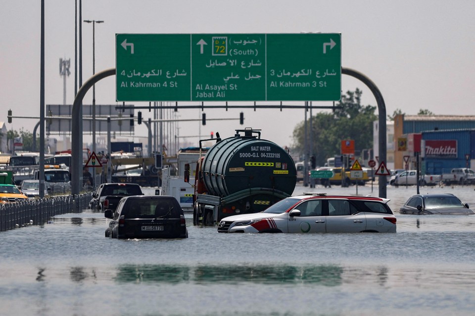 The streets of Dubai were swamped with water and cars after the flooding two weeks ago and once again last night