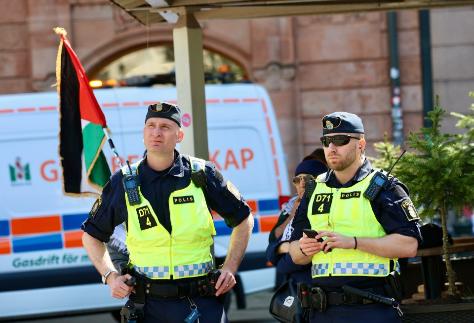 There is a heavy police presence outside the town hall in the main square in Malmo